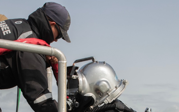 U.S. Navy Divers, Latvian Divers Remove Navigation Hazard During BALTOPS 25
