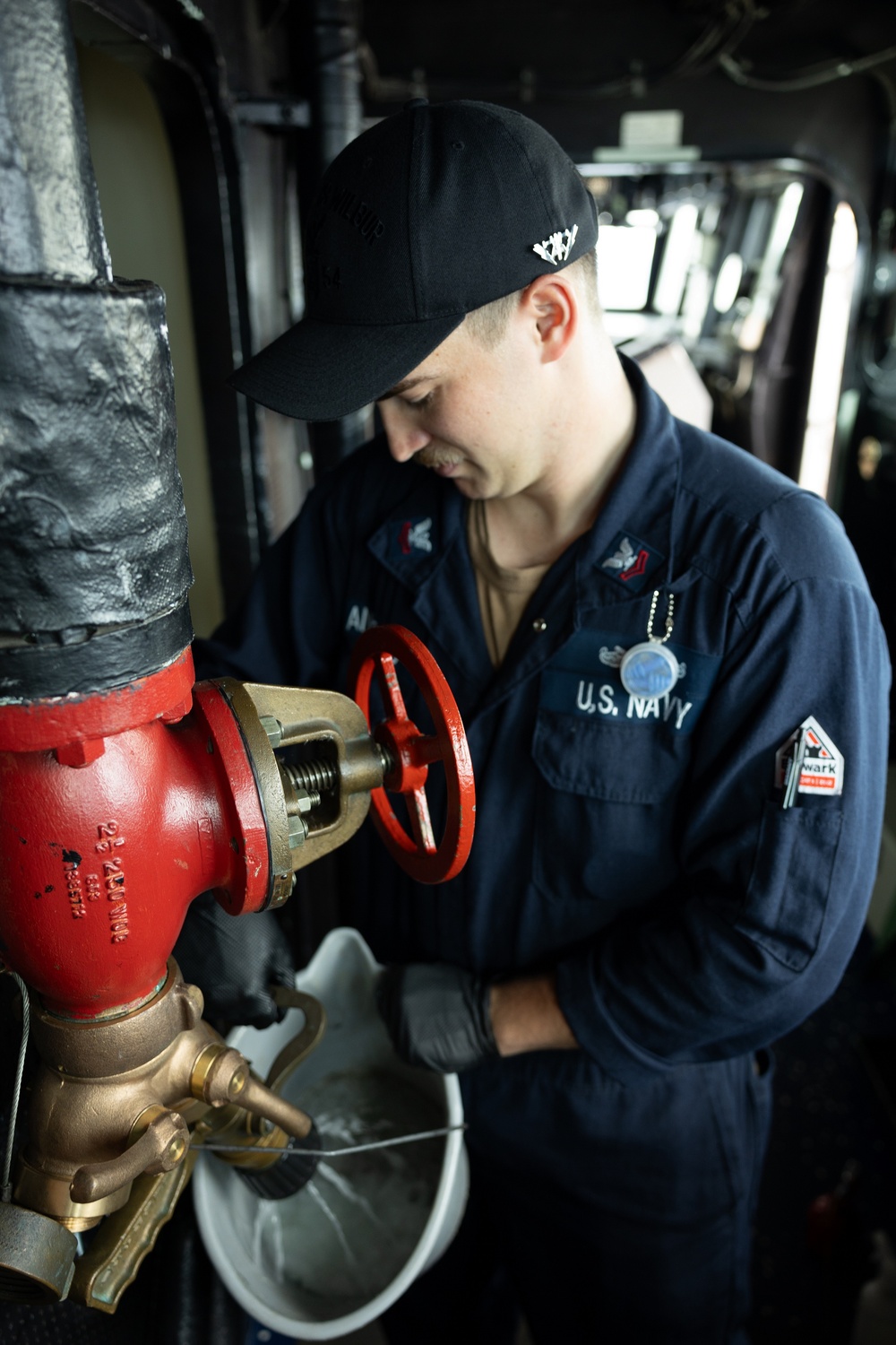Curtis Wilbur Sailor Conducts Maintenance