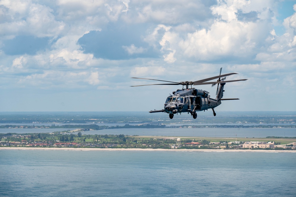 Rescue Airmen conduct two-ship training flight