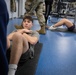 Student flight Airman participate in a mock Air Force Physical Fitness Assessment