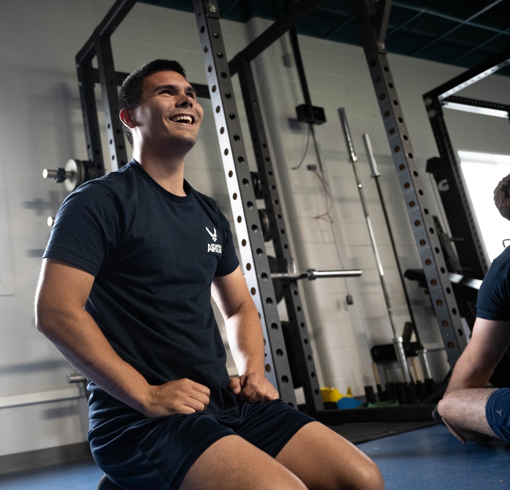 Student flight Airman participate in a mock Air Force Physical Fitness Assessment