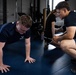 Student flight Airman participate in a mock Air Force Physical Fitness Assessment