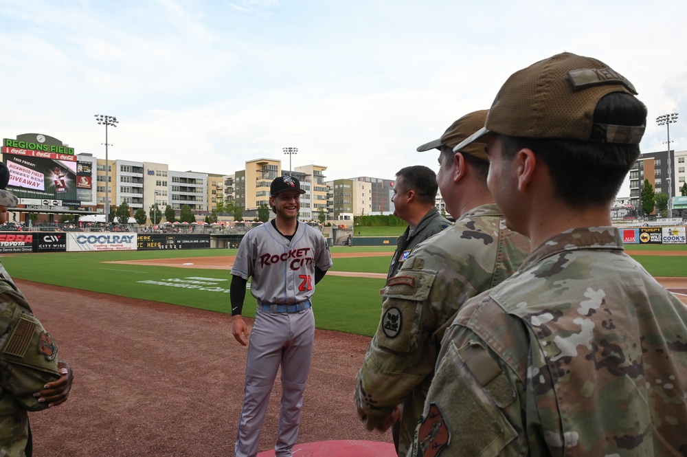 117ARW throws first pitch at Bham Baron's Game