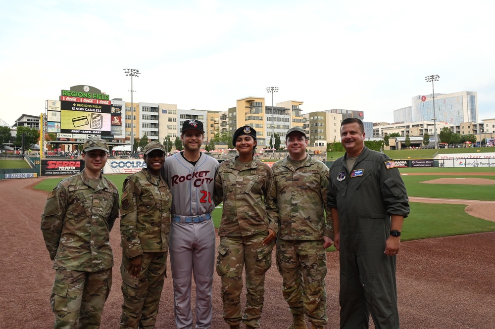 117ARW throws first pitch at Bham Baron's Game