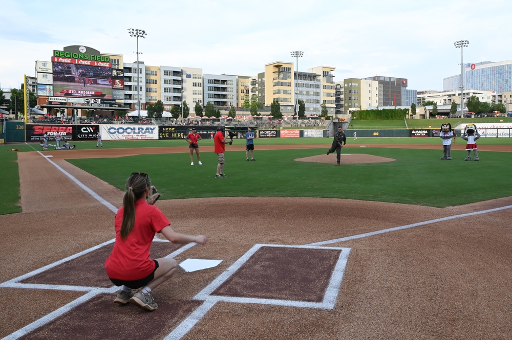 117ARW throws first pitch at Bham Baron's Game