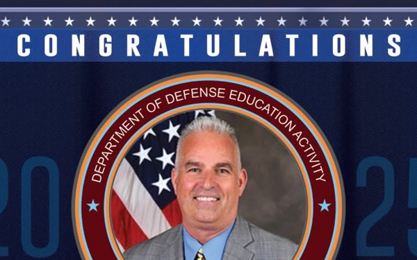 Leading with purpose: QMHS principal honored for transforming military student education