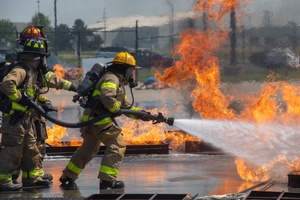 Fort McCoy Natural Resources Branch Chief speaks to media aboout prescribed burn process