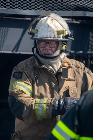 Fort McCoy Natural Resources Branch Chief speaks to media aboout prescribed burn process