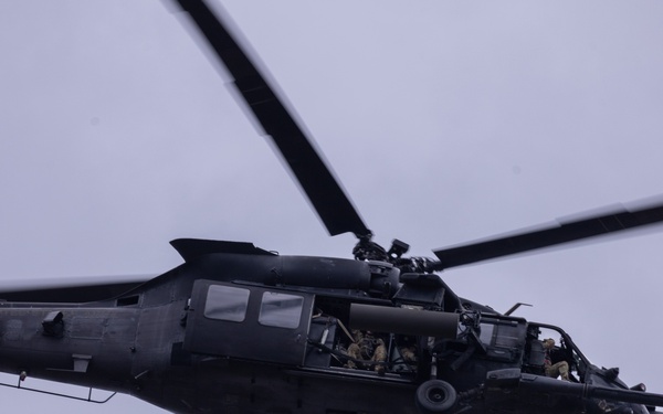Military aircraft fly over Fort Bragg