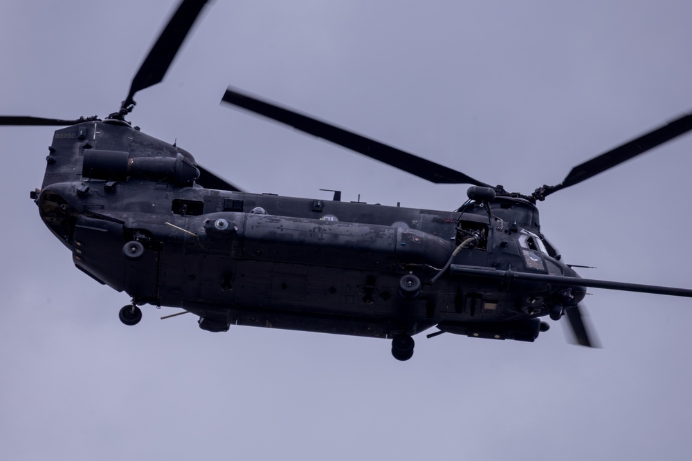 Military aircraft fly over Fort Bragg