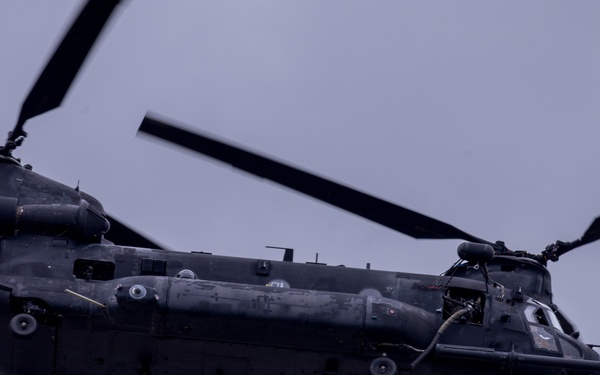 Military aircraft fly over Fort Bragg