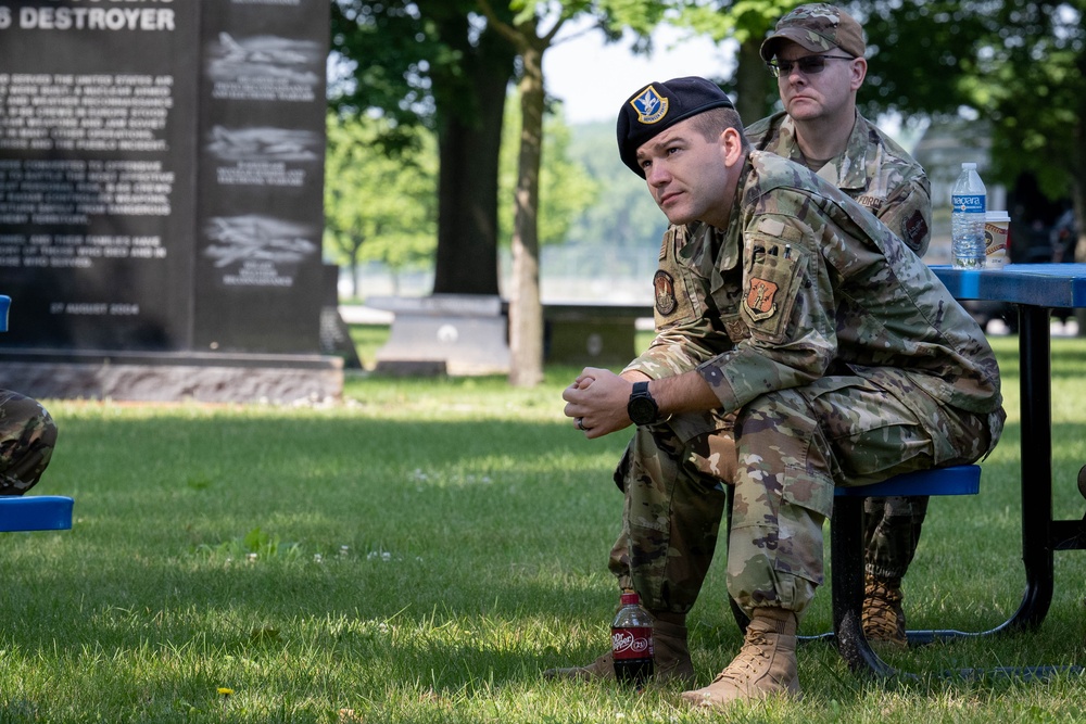 181st Security Forces Squadron attend a professional development briefing at the National Museum of the US Air Force