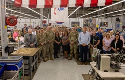 Program Executive Office (PEO) Soldier, join Aerial Machine and Tool Corp. personnel in a Group Photo