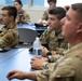 181st Security Forces Squadron attend a professional development briefing at the National Museum of the US Air Force