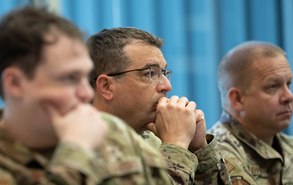 181st Security Forces Squadron attend a professional development briefing at the National Museum of the US Air Force
