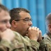 181st Security Forces Squadron attend a professional development briefing at the National Museum of the US Air Force