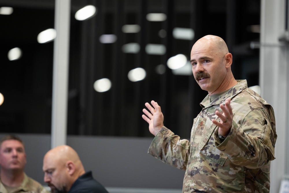 181st Security Forces Squadron attend a professional development briefing at the National Museum of the US Air Force