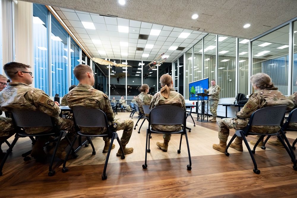 181st Security Forces Squadron attend a professional development briefing at the National Museum of the US Air Force