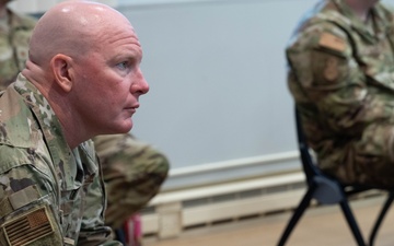 181st Security Forces Squadron attend a professional development briefing at the National Museum of the US Air Force