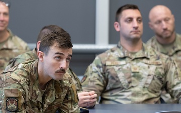181st Security Forces Squadron attend a professional development briefing at the National Museum of the US Air Force
