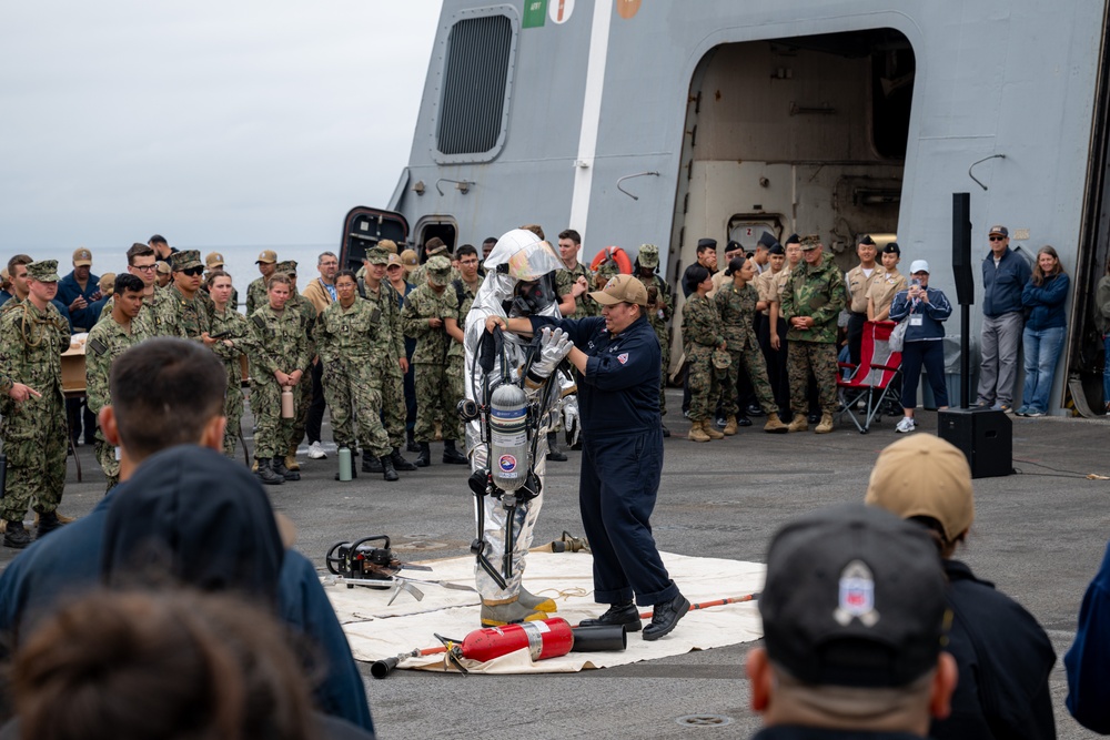Family, friends and midshipmen embark USS Somerset for Tiger Cruise
