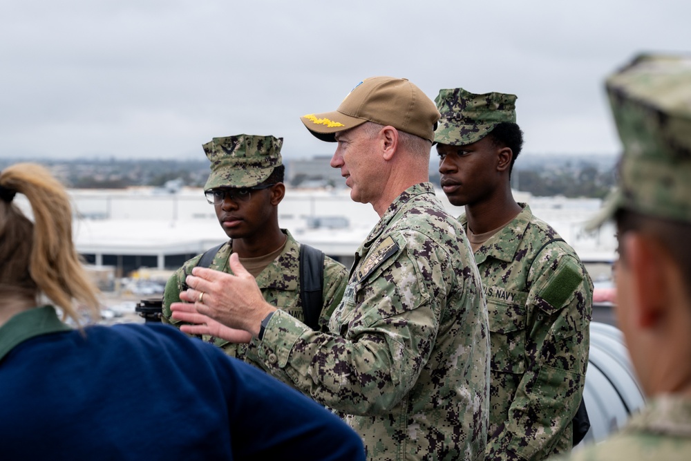 Family, friends and midshipmen embark USS Somerset for Tiger Cruise