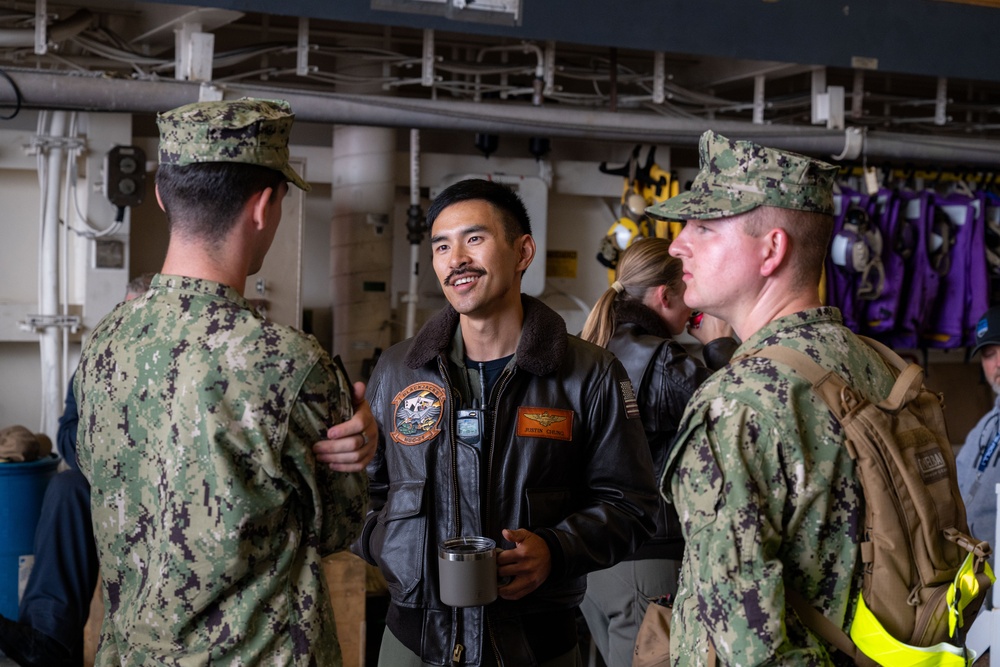 Family, friends and midshipmen embark USS Somerset for Tiger Cruise