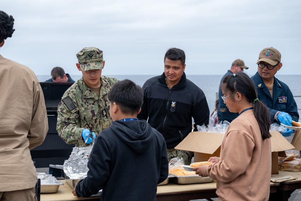 Family, friends and midshipmen embark USS Somerset for Tiger Cruise