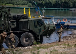 U.S. and Romanian soldiers Conduct Wet Gap Crossing during Saber Guardian 25 [Image 3 of 12]