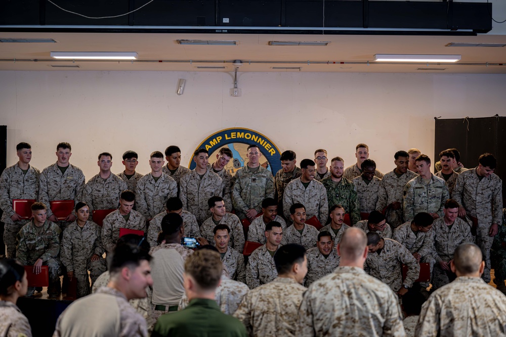 Service Members Graduate from Marine Corps Corporals Course