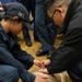 SA Terriejanniene NG and HM3 Timothy Efendy conduct Tactical Combat Casualty Care training