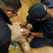 HM3 Timothy Efendy and LSSA David Simmons conduct Tactical Combat Casualty Care training