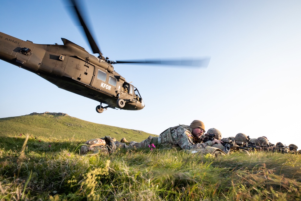 U.S. Soldiers assigned to the NATO-led KFOR mission conduct routine security patrol