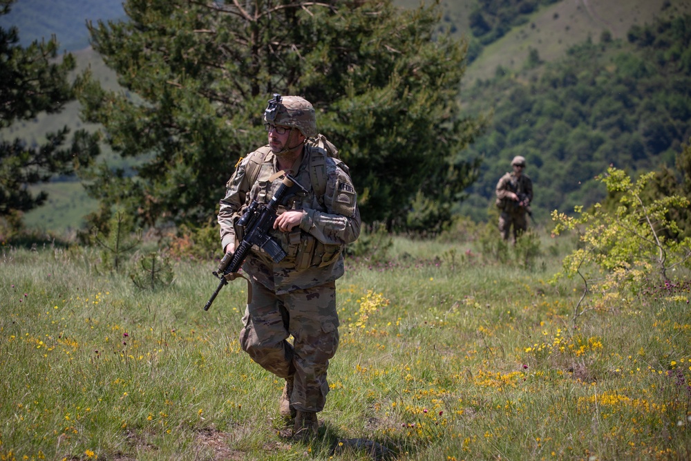 U.S. Soldiers assigned to the NATO-led KFOR mission conduct routine security patrol