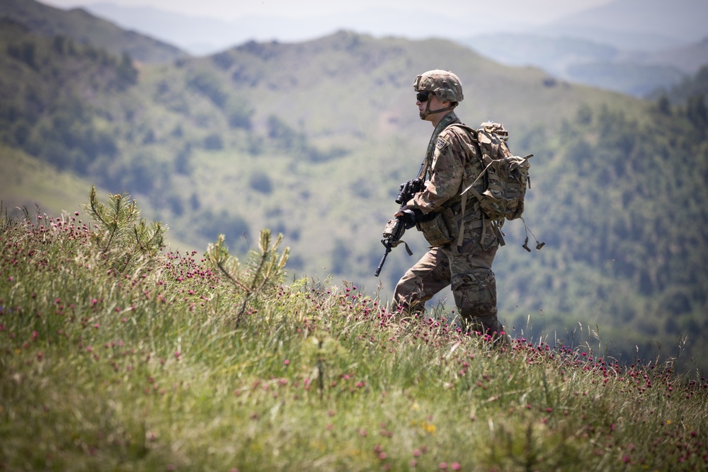 U.S. Soldiers assigned to the NATO-led KFOR mission conduct routine security patrol