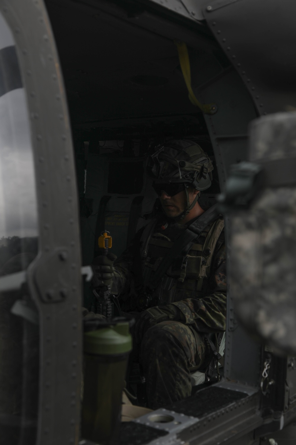 German soldier participates in JRTC helicopter loading exercise