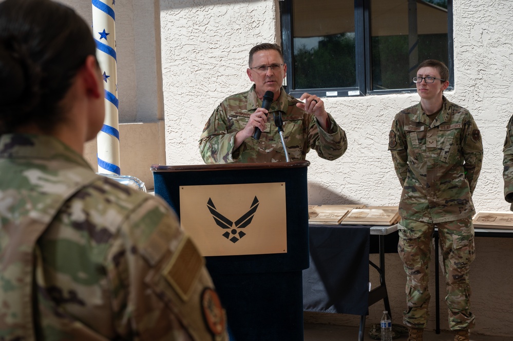 Chief Master Sgt. Travis B. Chadick, command chief master sergeant of the Air Force Nuclear Weapons Center, speaks to attendees of the master sergeant release party