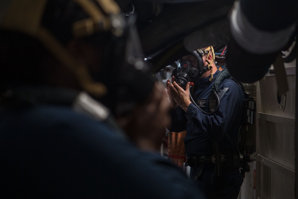 Sailors train for toxic gas aboard USS Ronald Reagan (CVN 76)