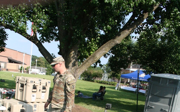 Engineers from the 412th Theater Engineer Command provide equipment displays at the Twilight Tattoo