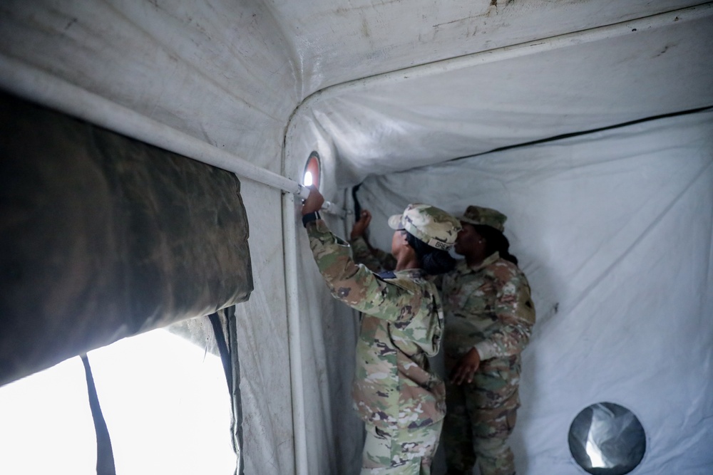 District of Columbia National Guard  Culinary Specialist team up with Pennsylvania National Guard to work on Containerized Kitchen
