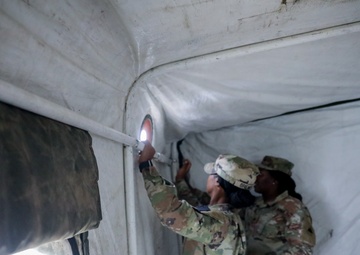 District of Columbia National Guard  Culinary Specialist team up with Pennsylvania National Guard to work on Containerized Kitchen