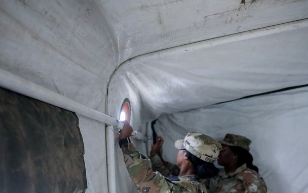 District of Columbia National Guard  Culinary Specialist team up with Pennsylvania National Guard to work on Containerized Kitchen
