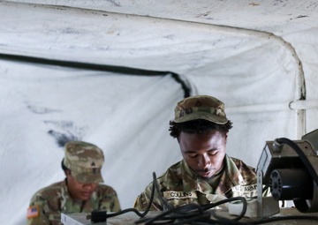 District of Columbia National Guard  Culinary Specialist team up with Pennsylvania National Guard  to work on Containerized Kitchen