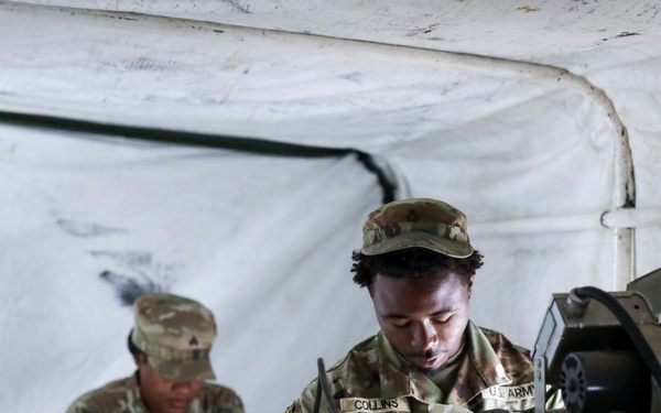 District of Columbia National Guard  Culinary Specialist team up with Pennsylvania National Guard  to work on Containerized Kitchen