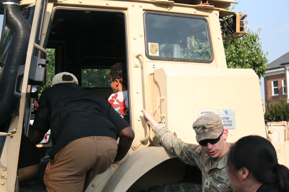 Engineers from the 412th Theater Engineer Command provide equipment displays at the Twilight Tattoo
