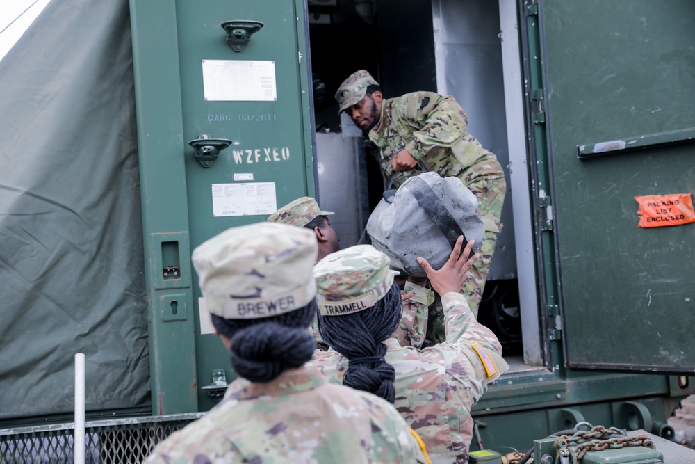 District of Columbia National Guard  Culinary Specialist team up with Pennsylvania National Guard  to work on Containerized Kitchen