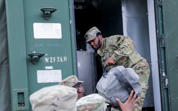 District of Columbia National Guard  Culinary Specialist team up with Pennsylvania National Guard  to work on Containerized Kitchen