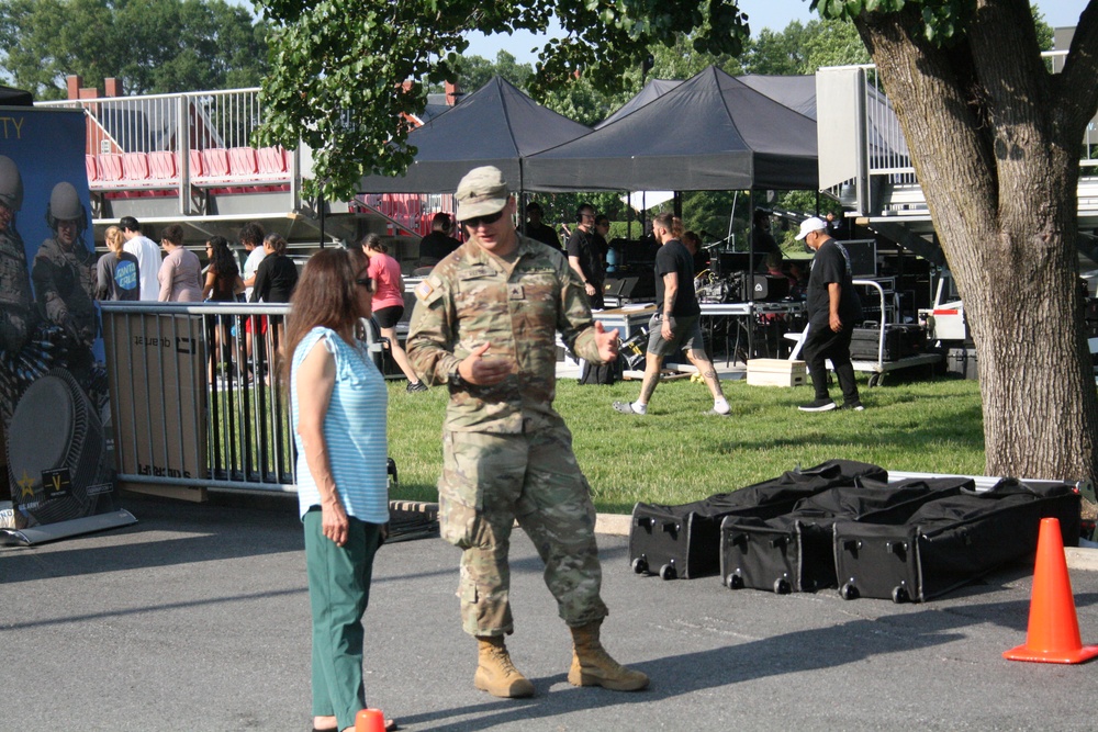 Engineers from the 412th Theater Engineer Command provide equipment displays at the Twilight Tattoo