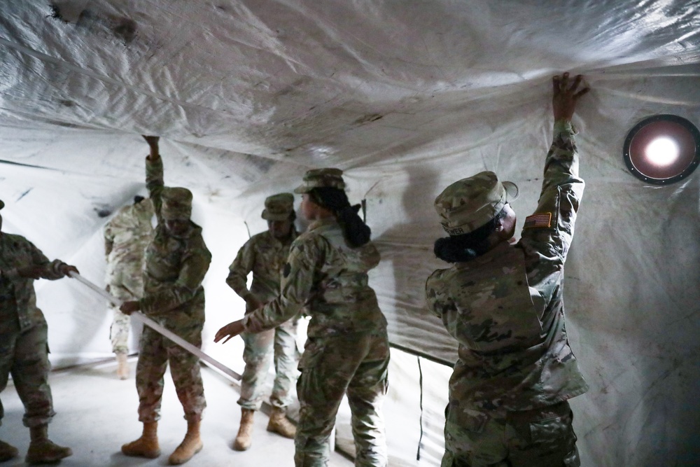 District of Columbia National Guard  Culinary Specialist team up with Pennsylvania National Guard  to work on Containerized Kitchen