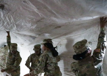 District of Columbia National Guard  Culinary Specialist team up with Pennsylvania National Guard  to work on Containerized Kitchen